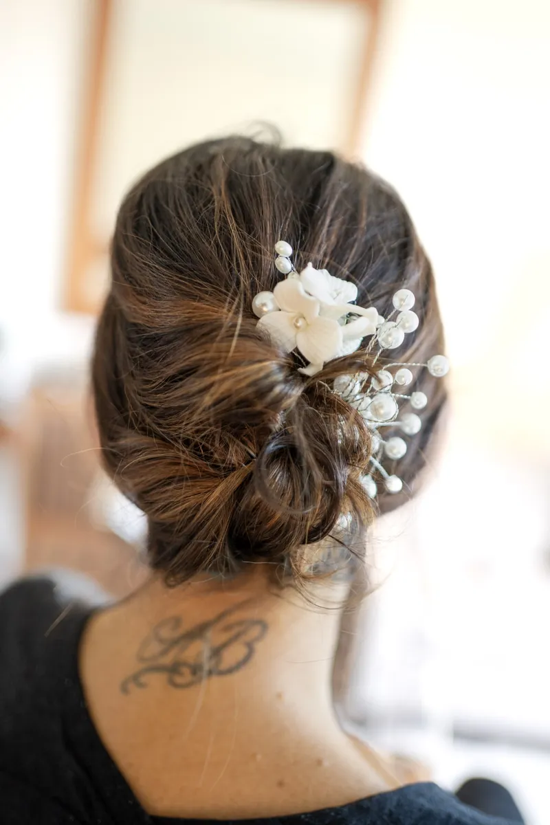 Bridal updo with pearl accessories
