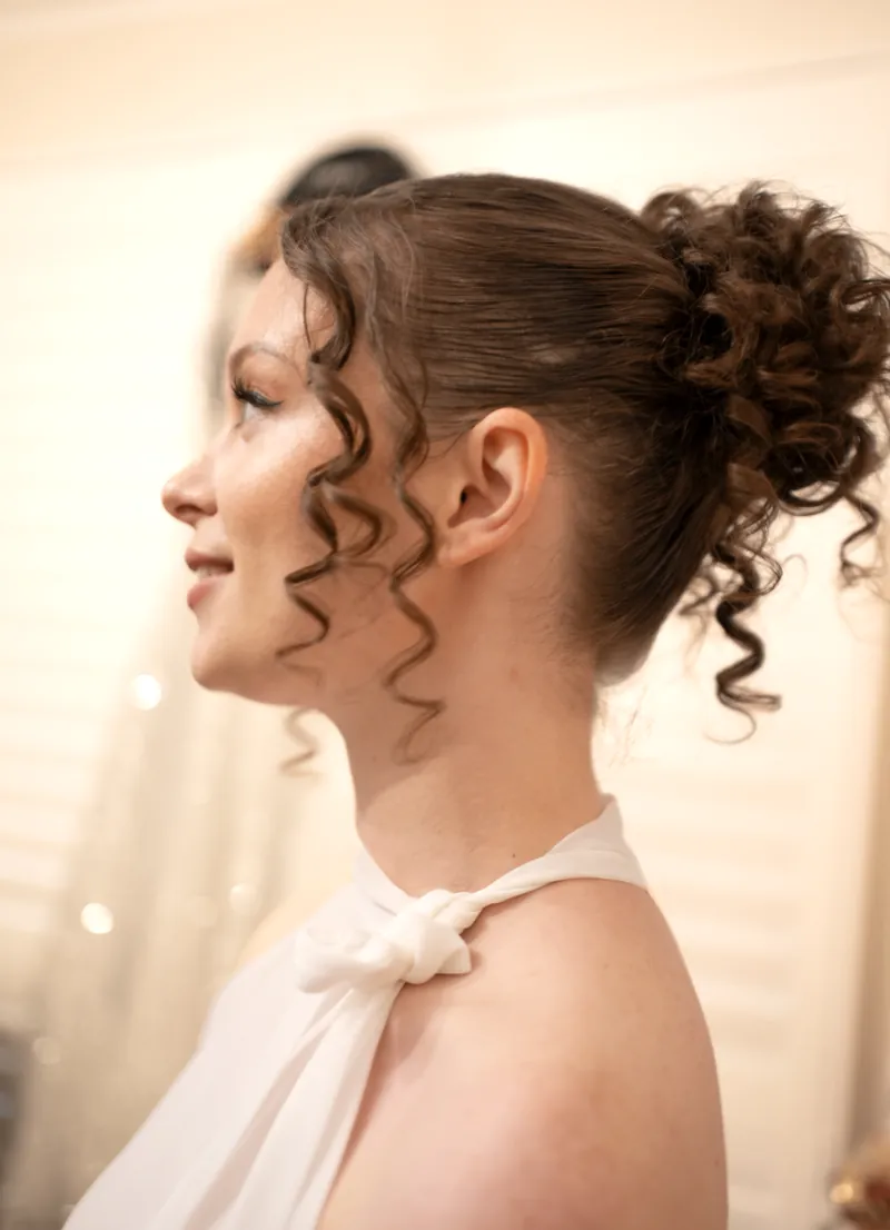 Curly elegant bun and natural dewy makeup